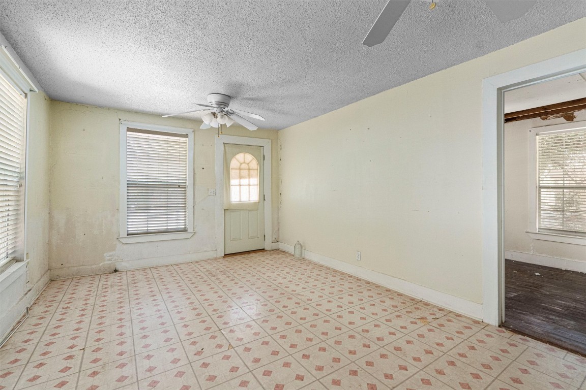 6311 Del Monte Road Austin, TX 78741 - Photo 6 of 24 a view of an empty room with a window