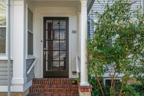 a bedroom with furniture and a bathtub