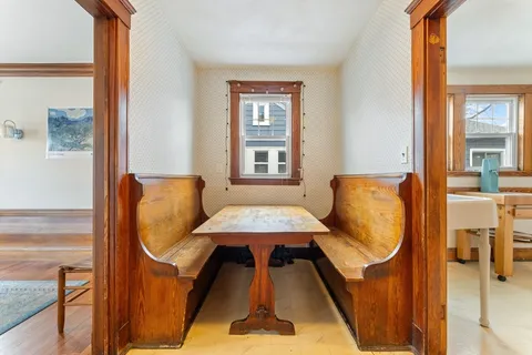 a kitchen with a stove and a refrigerator