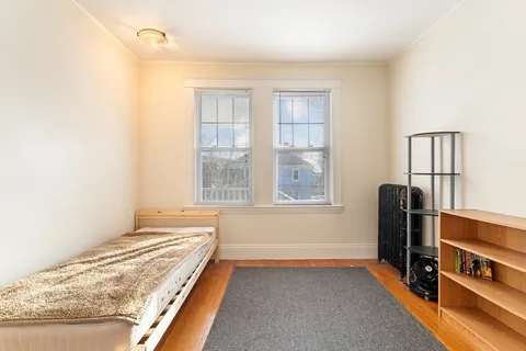 a view of a livingroom with furniture and wooden floor