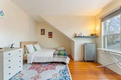 a view of a empty room with wooden roof