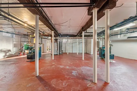 a view of storage and utility room with racks