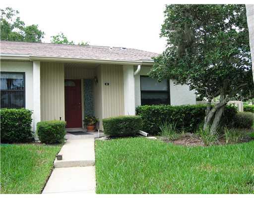 60 Tads Trail Oldsmar, FL 34677 - Photo 1 of 1 a front view of a house with a yard