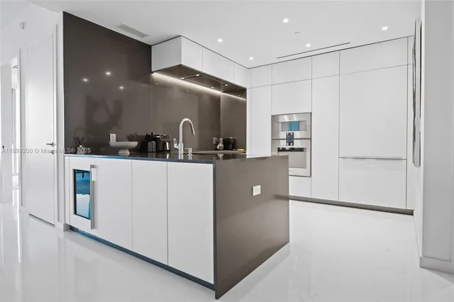 a view of a kitchen with a sink