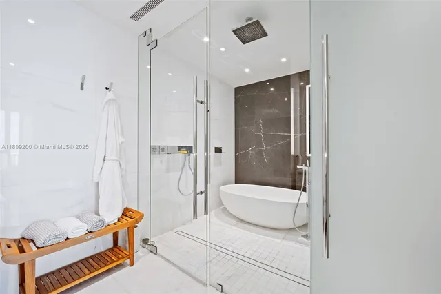 a bathroom with a shower and a toilet