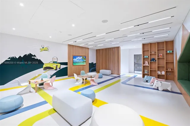 a very nice looking dining room with a table and chairs