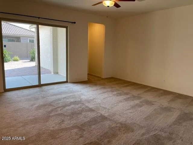 an empty room with a mirror