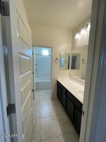 a bathroom with a bathtub a toilet a sink and a shower