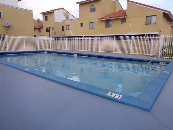 a view of a house with a swimming pool