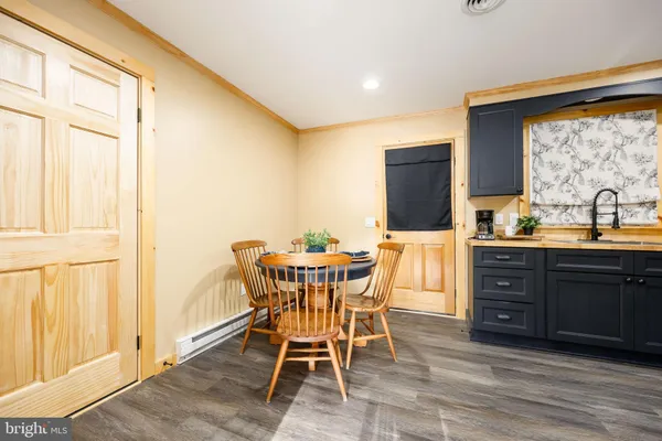 a kitchen with a sink and cabinets