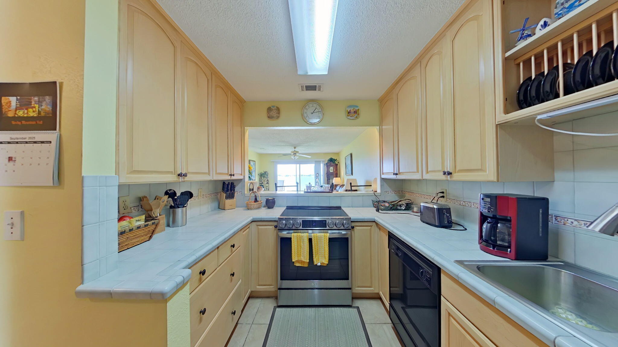 1695 Highway 98, Unit 102 Mary Esther, FL 32569 - Photo 11 of 27 a kitchen with a sink cabinets and window