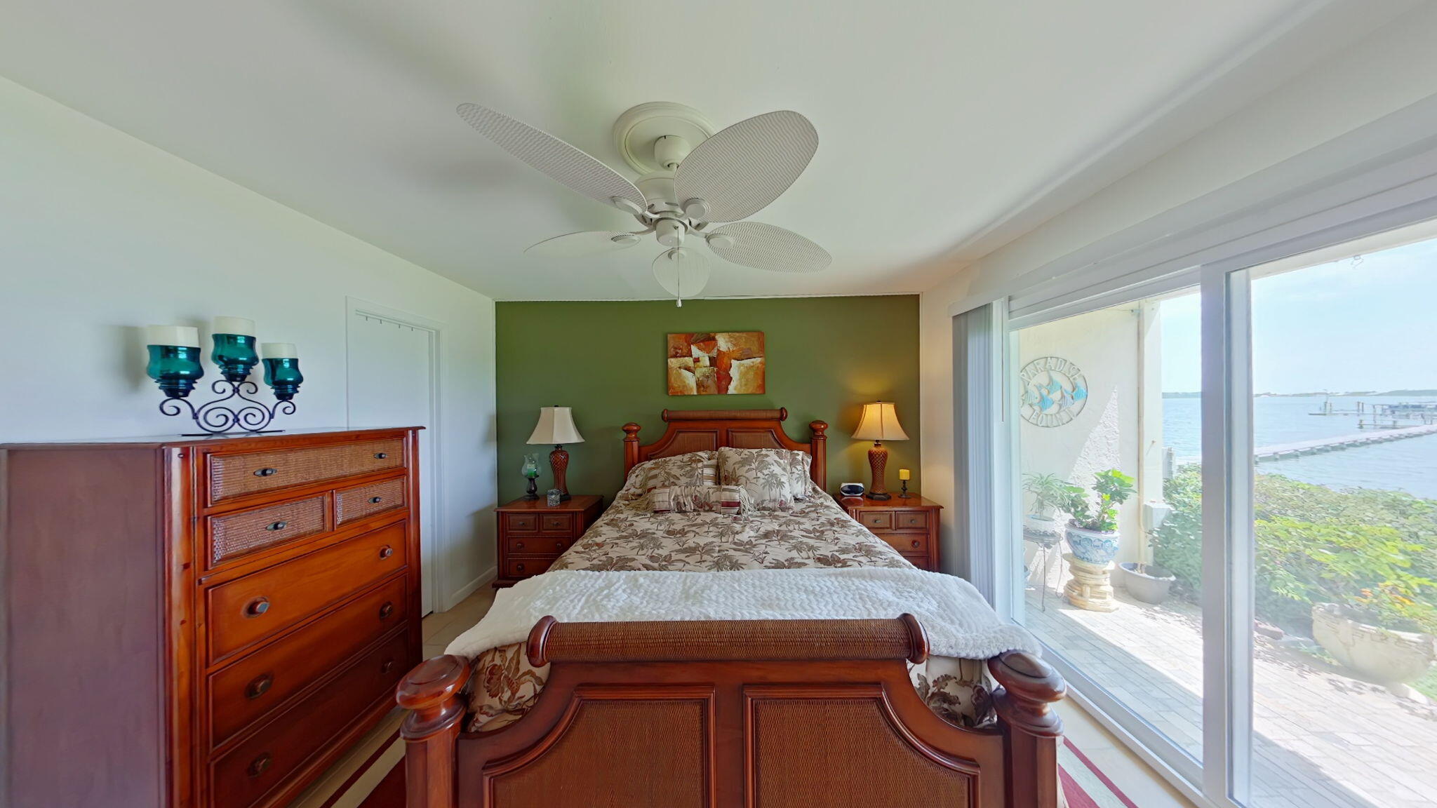1695 Highway 98, Unit 102 Mary Esther, FL 32569 - Photo 14 of 27 a living room with furniture and a chandelier
