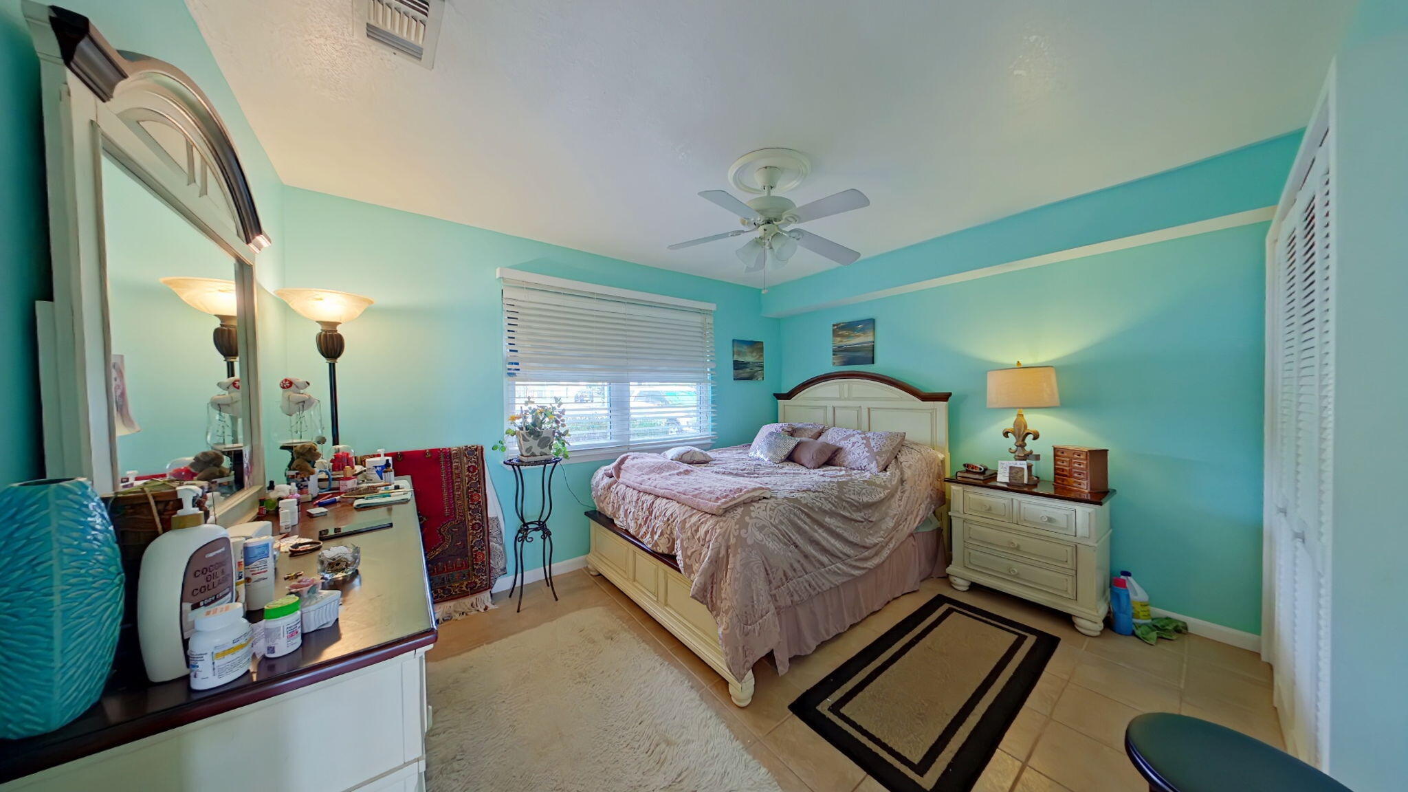 1695 Highway 98, Unit 102 Mary Esther, FL 32569 - Photo 18 of 27 a bedroom with bed and window