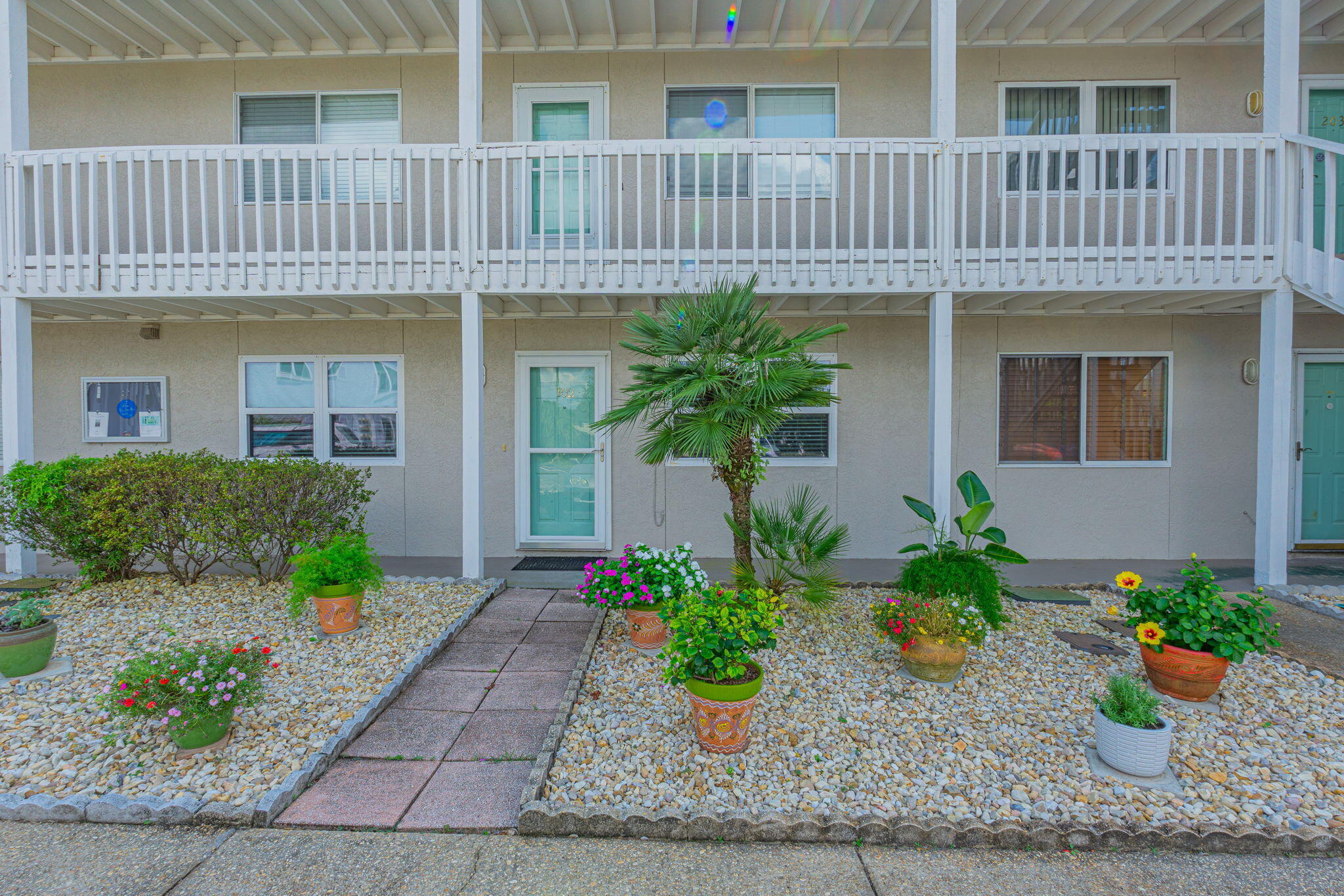 1695 Highway 98, Unit 102 Mary Esther, FL 32569 - Photo 2 of 27 a front view of a house