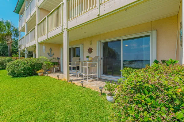 a view of a field with an ocean