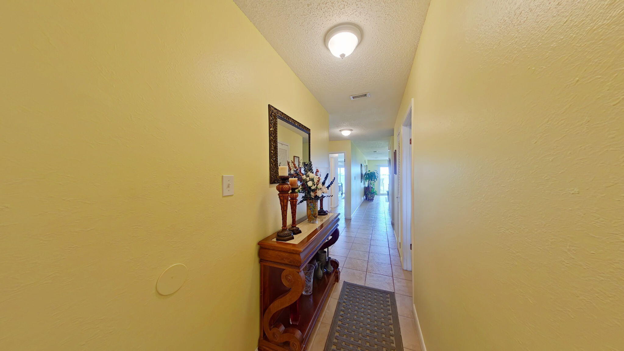 1695 Highway 98, Unit 102 Mary Esther, FL 32569 - Photo 3 of 27 a view of a livingroom with stairs