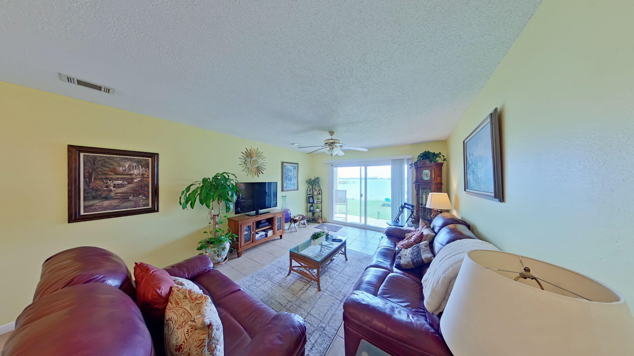 1695 Highway 98, Unit 102 Mary Esther, FL 32569 - Photo 6 of 27 a living room with furniture and a flat screen tv