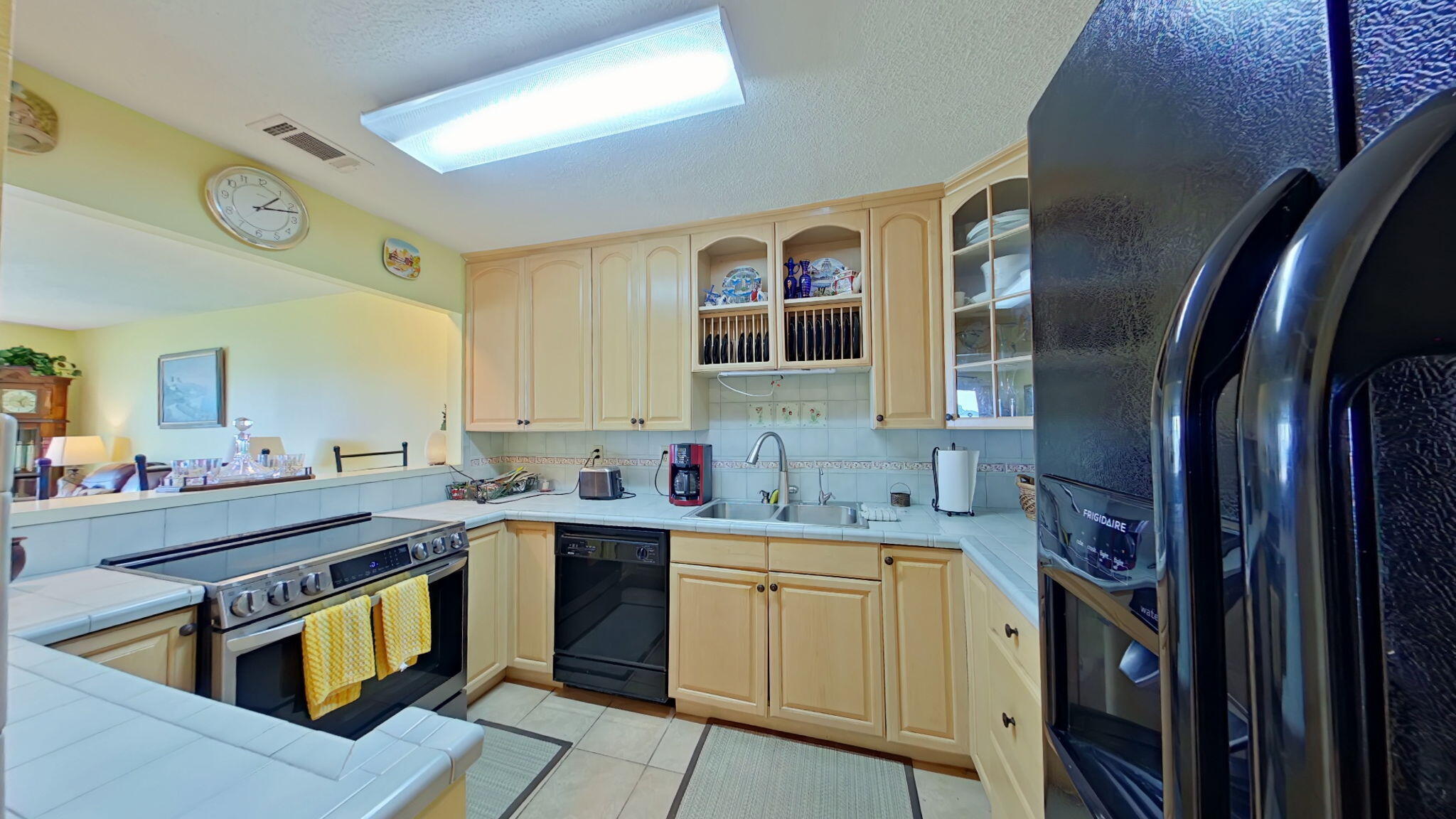 1695 Highway 98, Unit 102 Mary Esther, FL 32569 - Photo 9 of 27 a kitchen that has a sink and a stove in it
