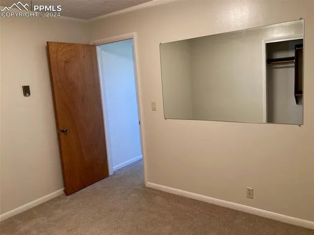 an empty room with closet