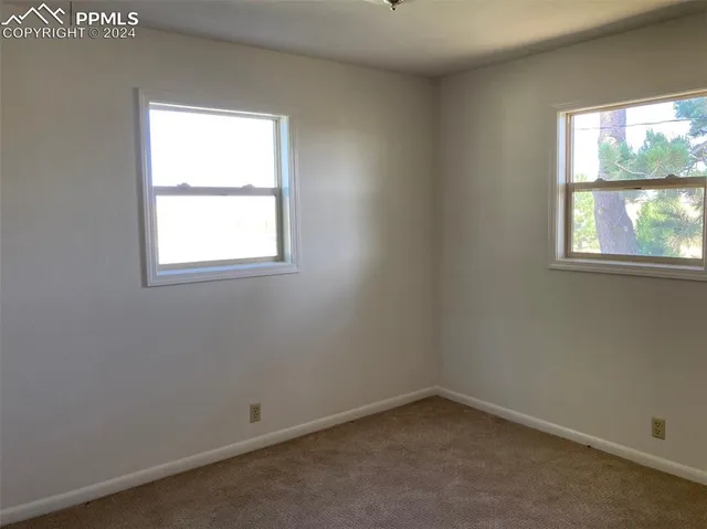 an empty room with a window