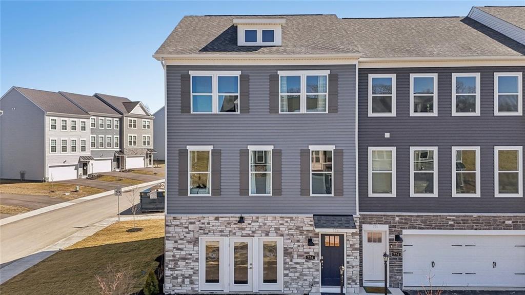 a front view of a house with a outdoor space