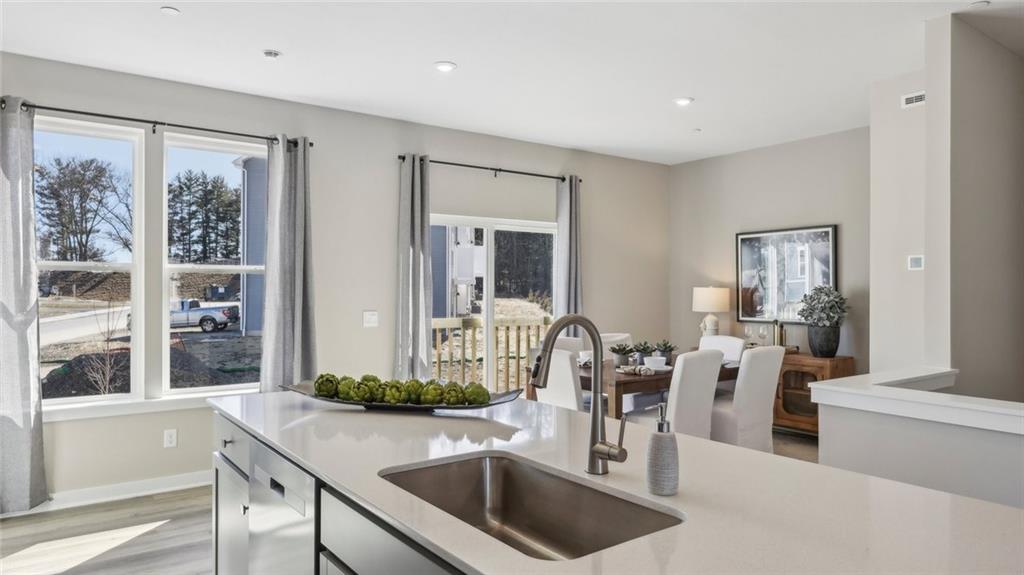 132 River Ridge Drive Coraopolis, PA 15108 - Photo 8 of 21 a kitchen with a sink and a refrigerator
