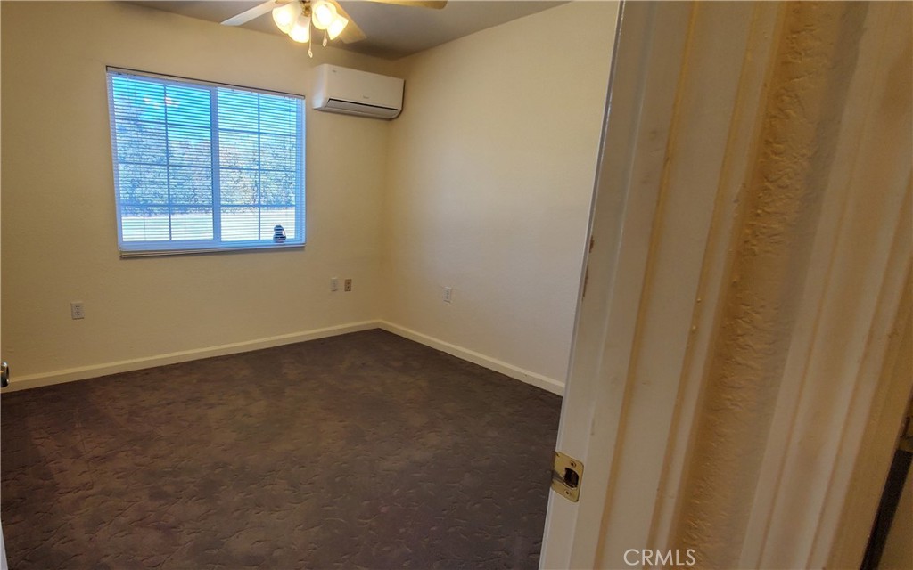 7486 Rodger Road Corning, CA 96021 - Photo 13 of 45 a view of an empty room with a window