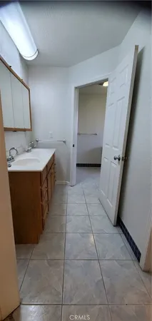 a bathroom with a toilet and a sink