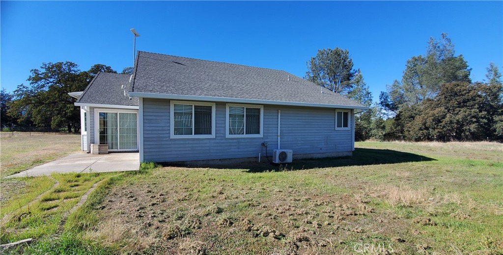 7486 Rodger Road Corning, CA 96021 - Photo 24 of 45 a view of a house with a yard