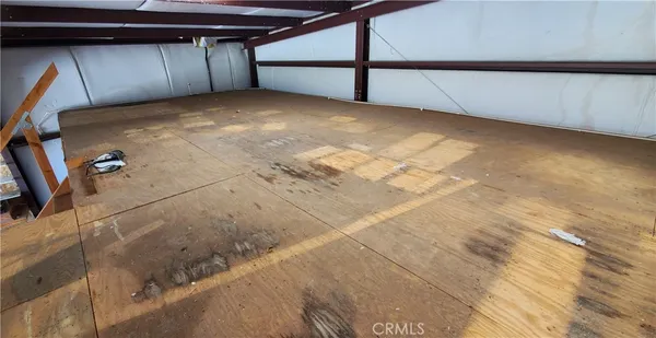 wooden floor with staircase