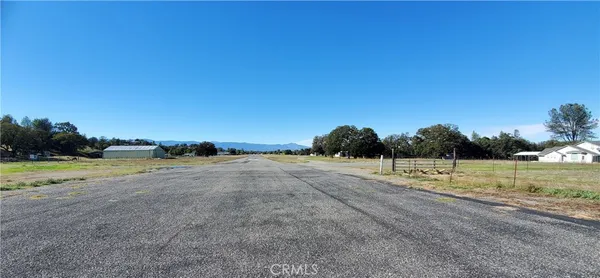 a view of a door with a street sign on a wall