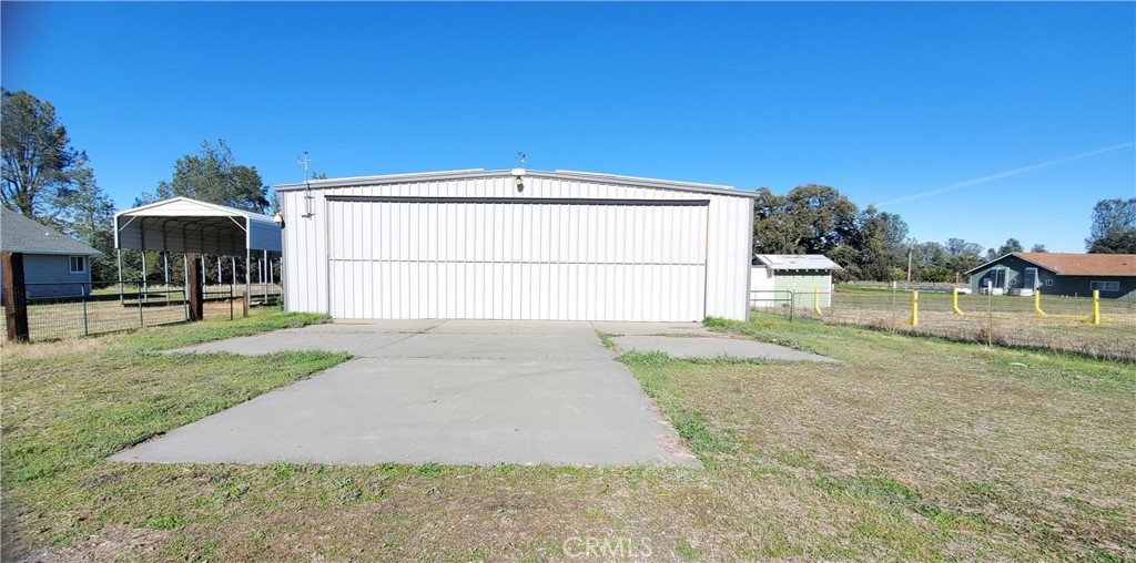 7486 Rodger Road Corning, CA 96021 - Photo 41 of 45 a view of backyard of house with green space