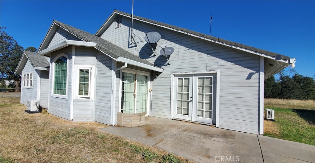 7486 Rodger Road Corning, CA 96021 - Photo 6 of 45 a front view of a house with a yard