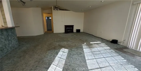 a view of a livingroom with a fireplace