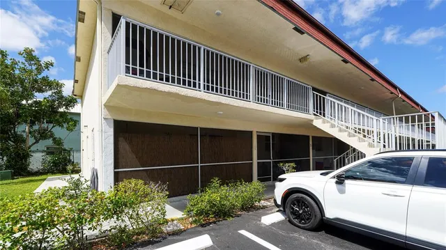 a car parked in front of a house