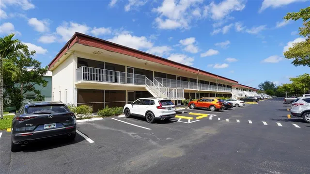 a car parked in front of a house