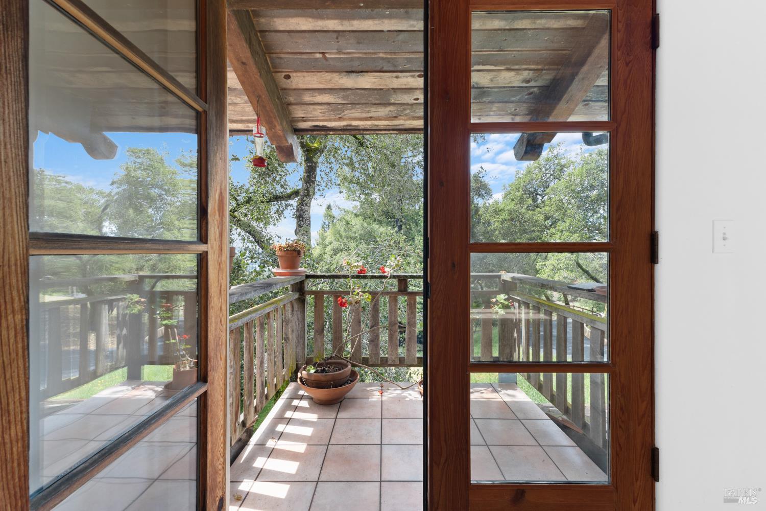 5262 Wikiup Court Santa Rosa, CA 95403 - Photo 17 of 56 a view of a glass door with a floor to ceiling window