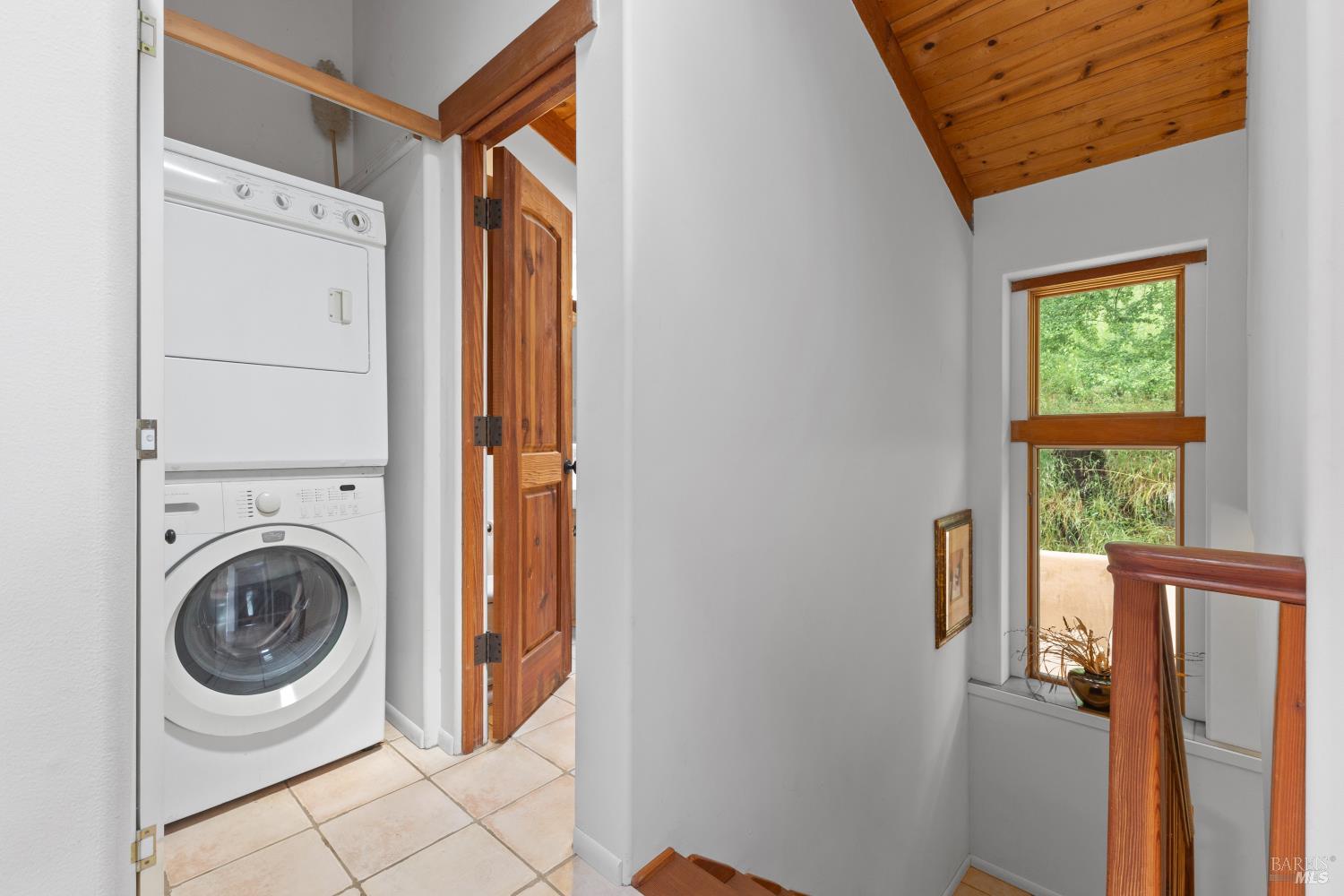 5262 Wikiup Court Santa Rosa, CA 95403 - Photo 19 of 56 a view of a hallway with washer and dryer