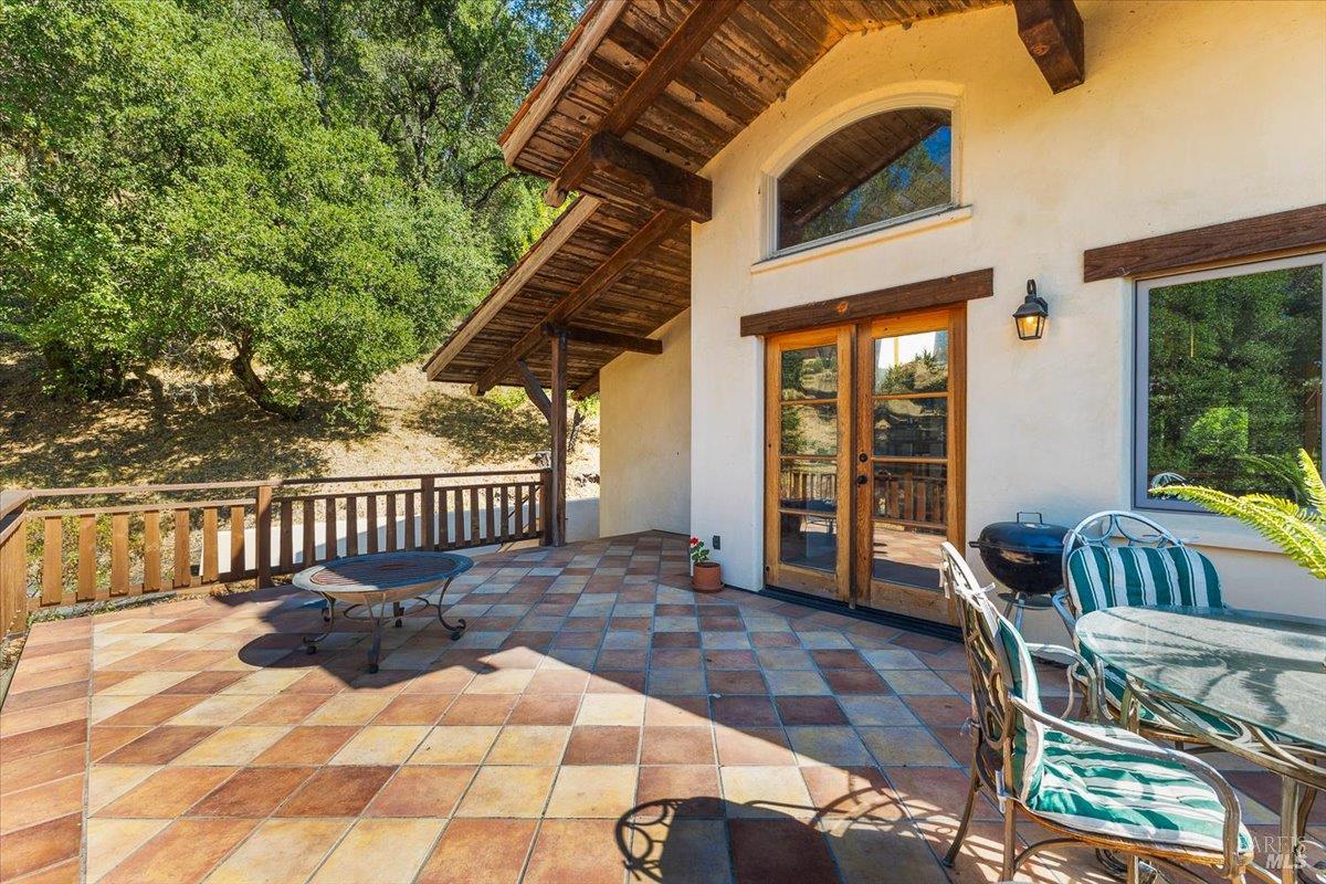 5262 Wikiup Court Santa Rosa, CA 95403 - Photo 20 of 43 a view of a porch with furniture and floor to ceiling window