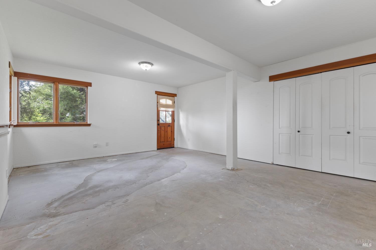 5262 Wikiup Court Santa Rosa, CA 95403 - Photo 22 of 56 a view of an empty room with a window