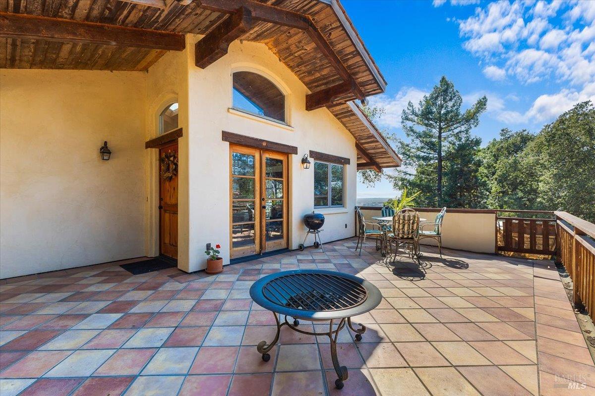5262 Wikiup Court Santa Rosa, CA 95403 - Photo 3 of 43 a view of a patio with a table and chairs