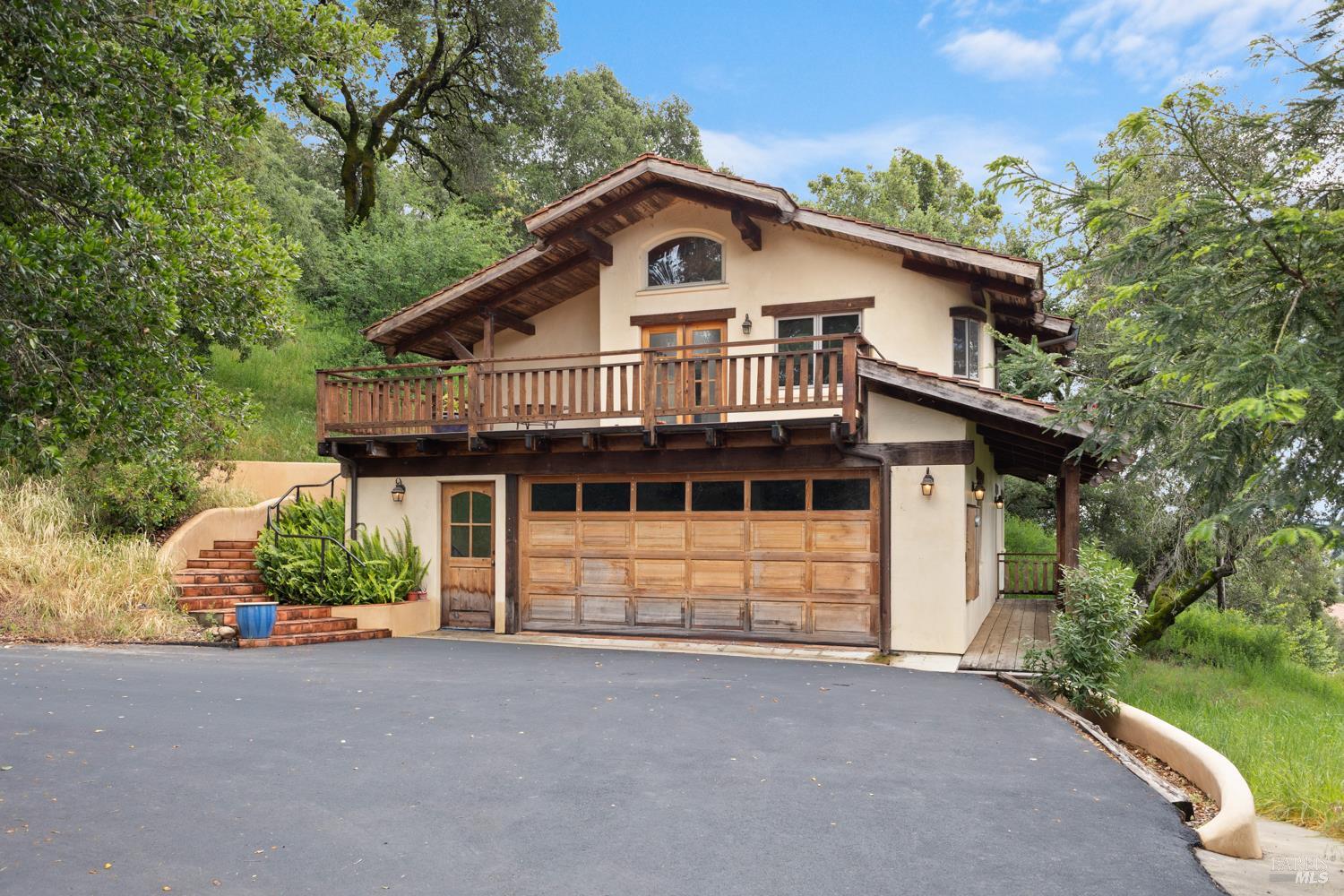 5262 Wikiup Court Santa Rosa, CA 95403 - Photo 34 of 56 a front view of a house with a garden