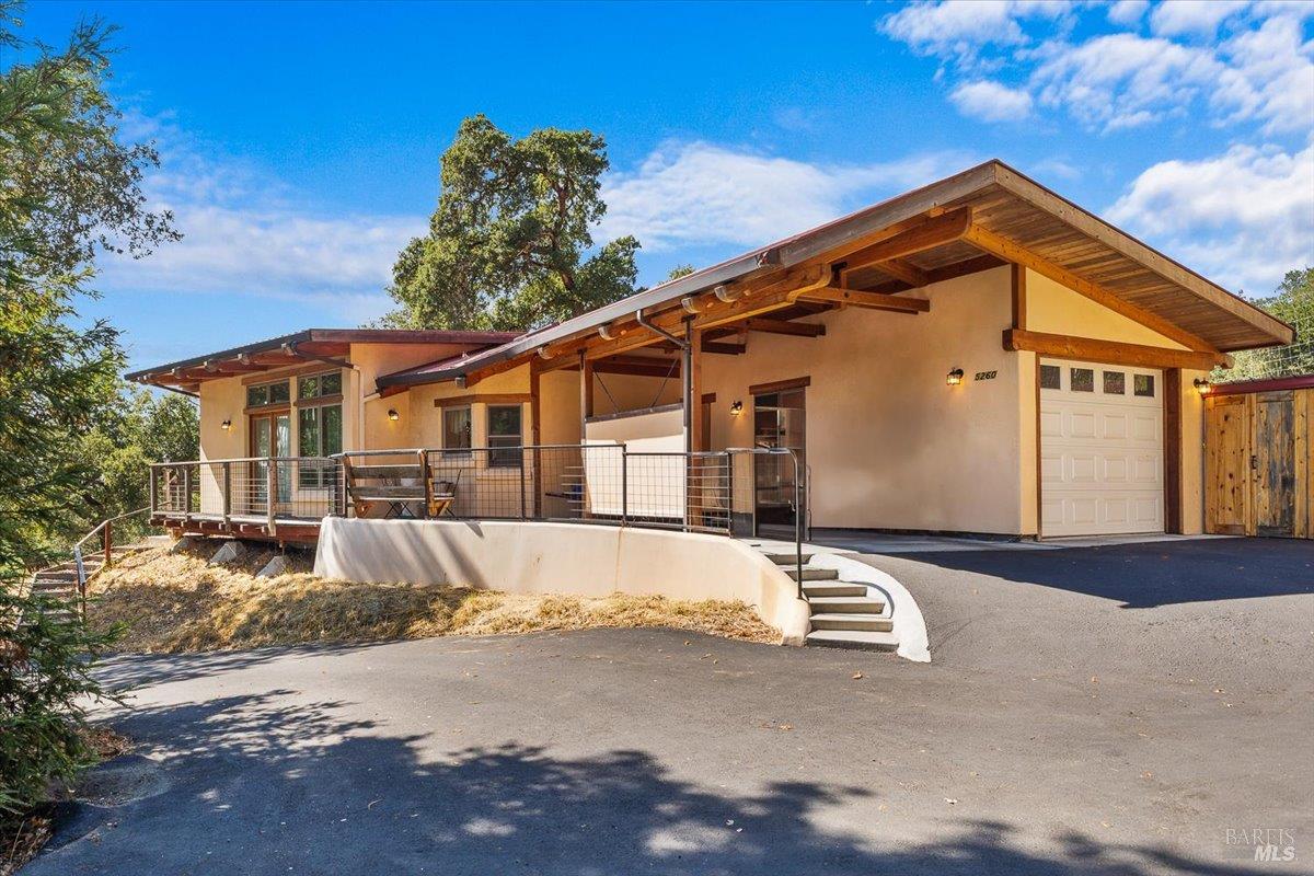 5262 Wikiup Court Santa Rosa, CA 95403 - Photo 38 of 56 a front view of a house with a yard