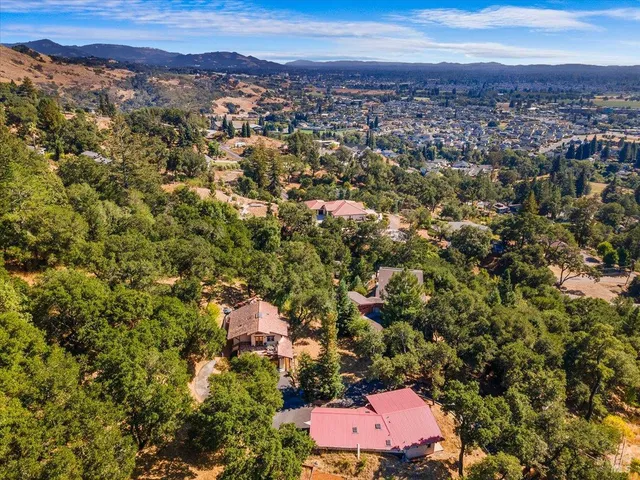 an aerial view of a city with lots of residential buildings