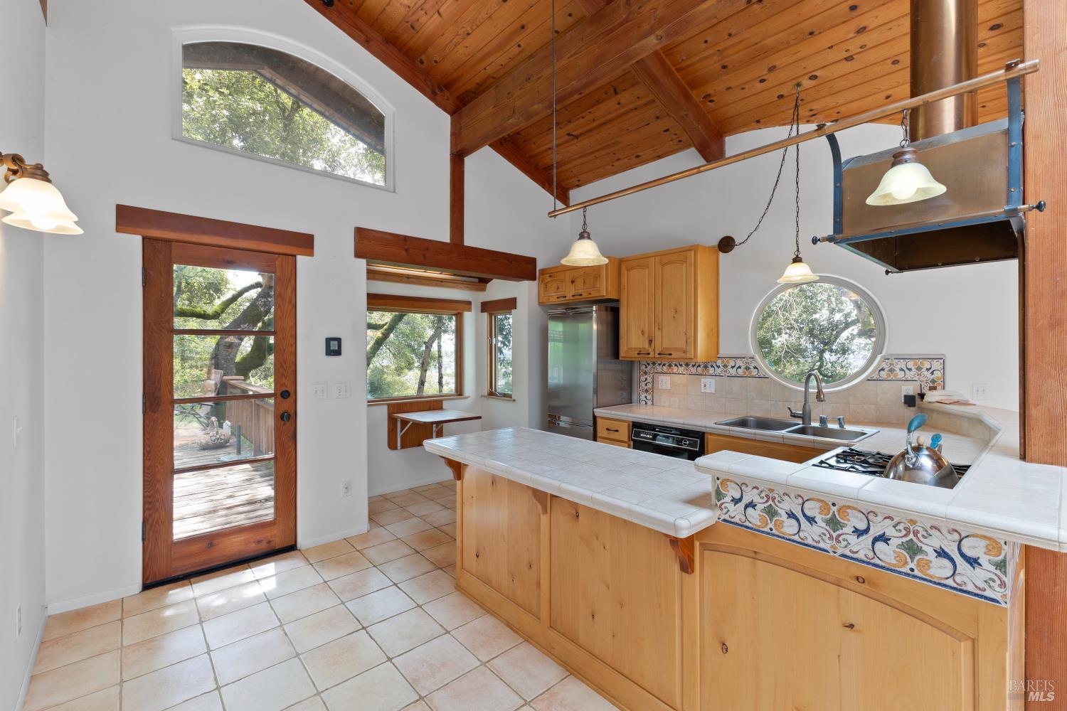 5262 Wikiup Court Santa Rosa, CA 95403 - Photo 10 of 56 a kitchen with a sink stove and cabinets