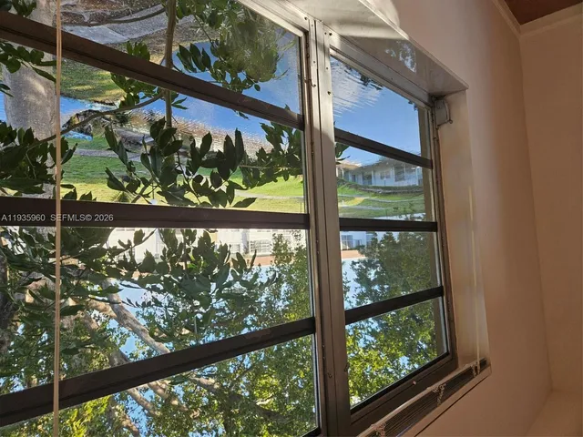 a kitchen with stainless steel appliances granite countertop a stove sink and microwave