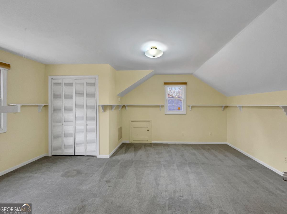 158 Lakeover Drive Athens, GA 30607 - Photo 26 of 48 an empty room with shelves