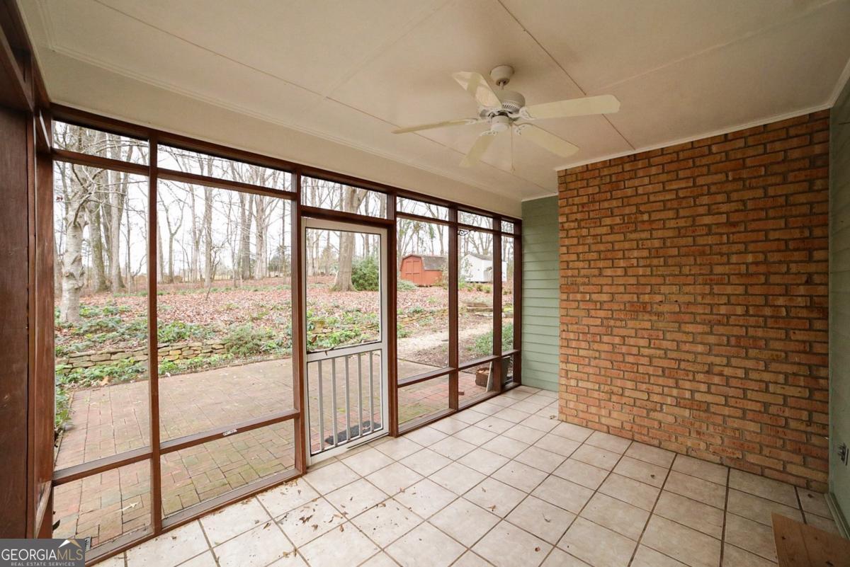158 Lakeover Drive Athens, GA 30607 - Photo 30 of 48 a view of an empty room and window