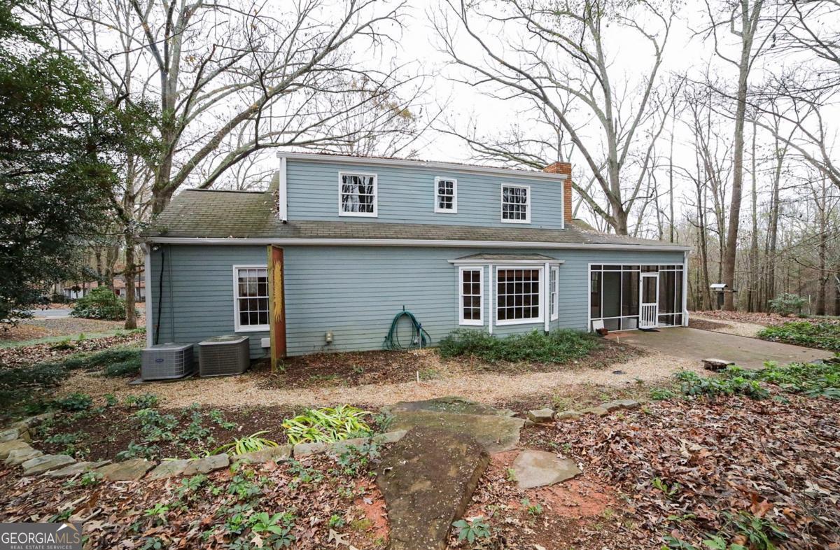 158 Lakeover Drive Athens, GA 30607 - Photo 36 of 48 a front view of a house with garden
