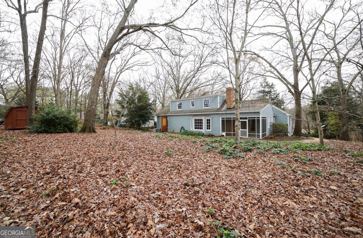 158 Lakeover Drive Athens, GA 30607 - Photo 39 of 48 a front view of a house with a garden